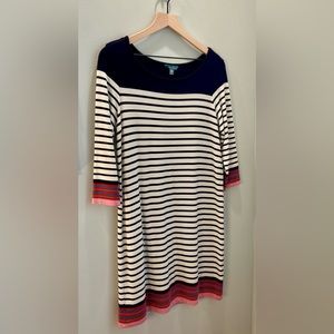 This classic navy striped dress has a touch of fun spring and summer color.